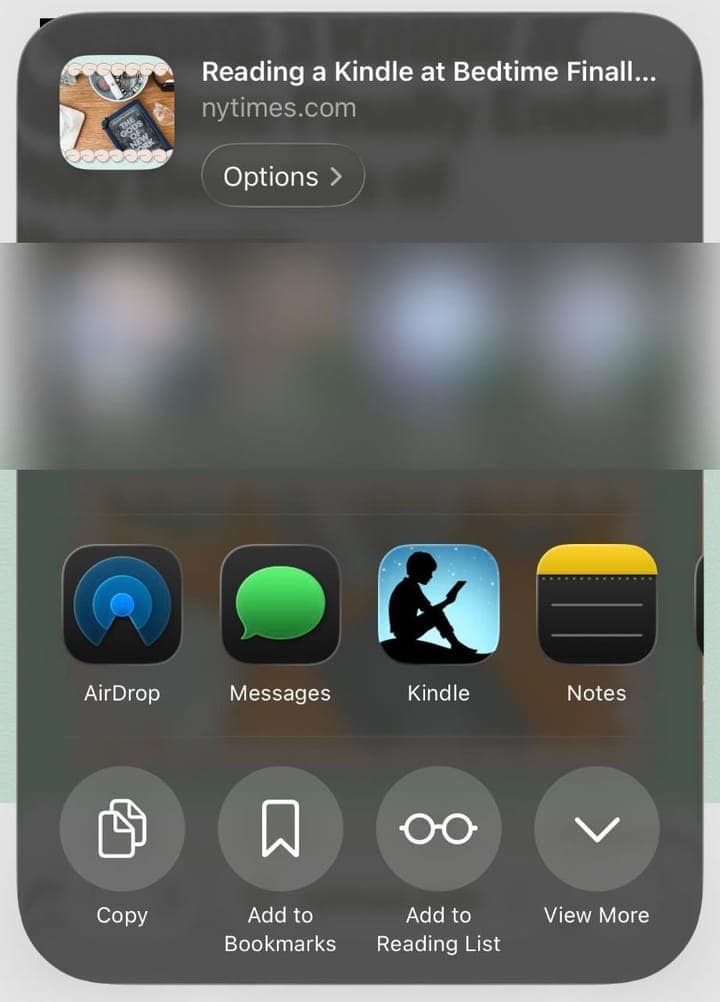 The iPhone share sheet for a New York Times article, with the Kindle app in the row of apps.